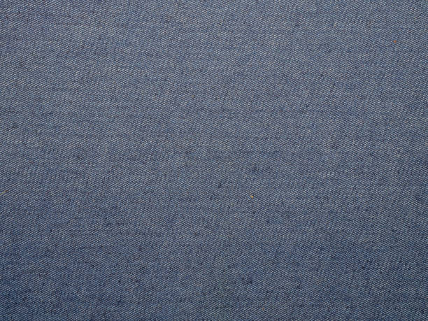 istock background of blue jeans denim texture. 1185136545