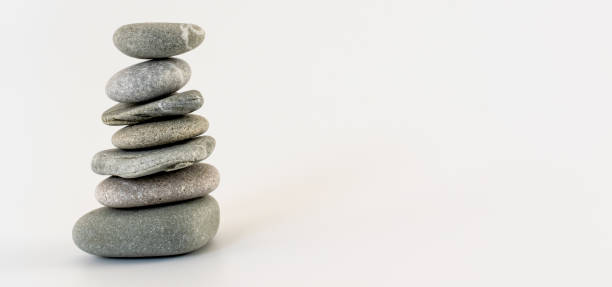 istock Balance concept. Stacked beach stones on white background. Copy space. 1185147502