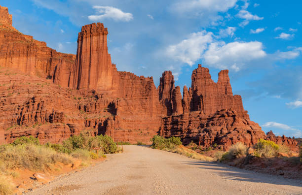 Fisher Towers Moab Utah.  Scenic view of iconic red rock canyon country.  Beautiful magic hour sunset light for saturated rich color.  Ancient Art rock formation.Converted from 14-bit RAW file.  ProPhoto RGB color space.