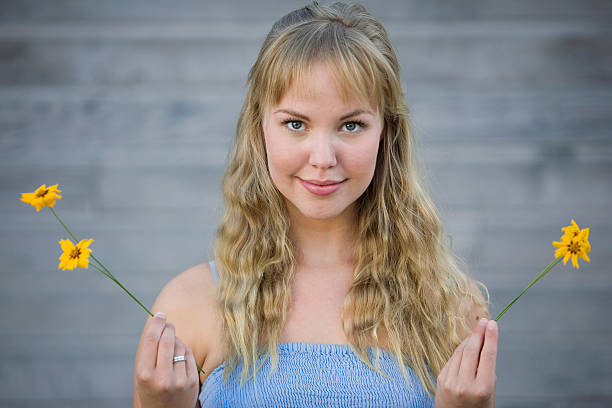 istock Woman Holding Flowers 118515606