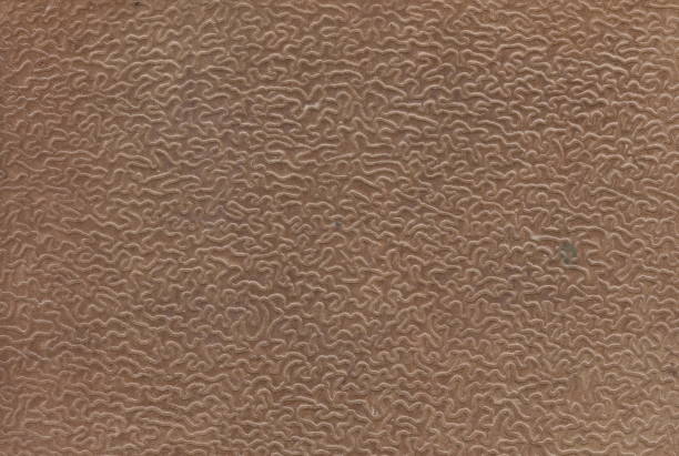 Digitally embossed image of light brown woven aida cloth used for cross stitch