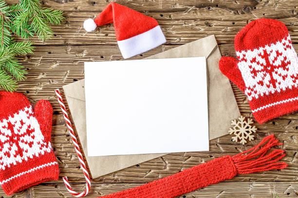 istock Christmas card mockup with Red Knitted Mittens 1185159131