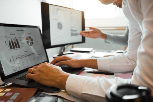 istock Two entrepreneur person working and colleague analyzing data for new start-up business and marketing. 1185167471