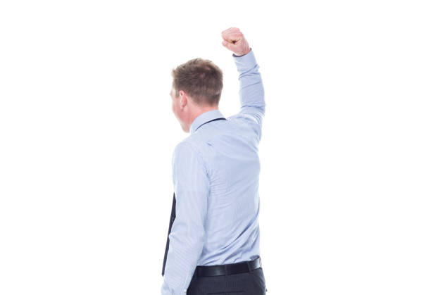 rear view / one person / waist up of 20-29 years old adult handsome people caucasian male / young men business person / businessman / manager in front of white background who is excited / happy / cheerful / successful who is and doing fist pump - 7070 imagens e fotografias de stock