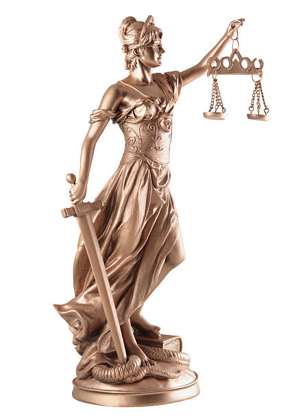 istock Bronze colored Lady Justice statue on a white background 118517457
