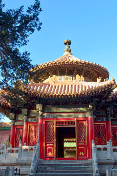istock historical traditional Chinese architecture. decorated roofs and centenary trees in the imperial garden. 1185174806