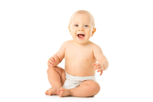 Small happy boy sitting. Full length Picture of small happy boy isolated. Full body. He is 8 months old baby1 stock pictures, royalty-free photos & images