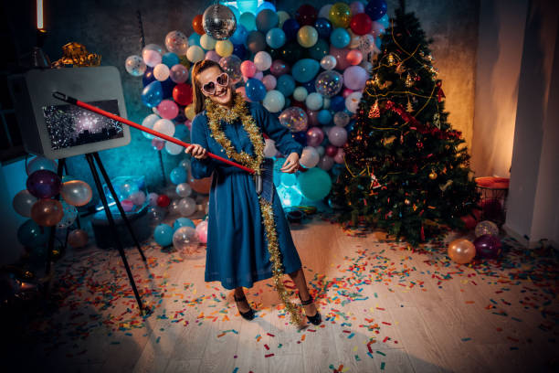 istock Sweeping the house after new year party 1185177629
