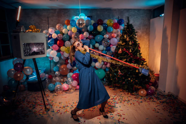 istock Sweeping the house after new year party 1185177644