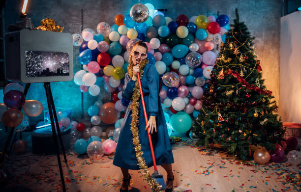 istock Sweeping the house after new year party 1185177658