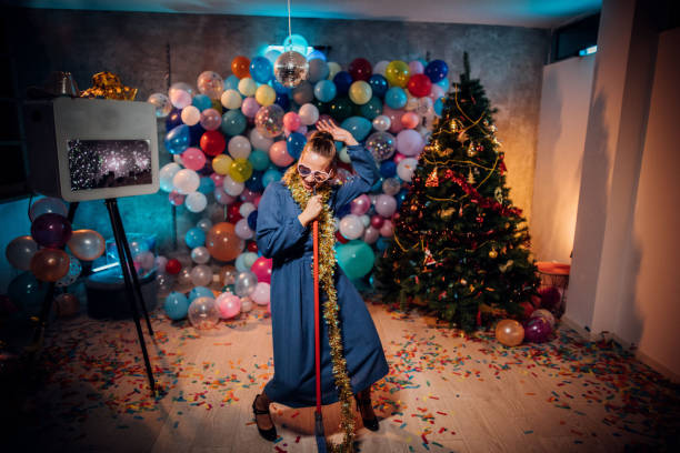 istock Sweeping the house after new year party 1185177688
