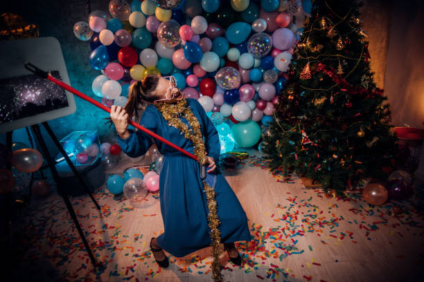 istock Dancing and cleaning after new year party 1185178595