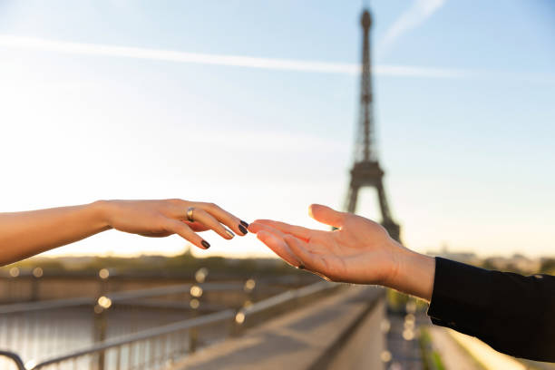 istock Romantic marriage proposal in Paris near Eiffel tower 1185178803