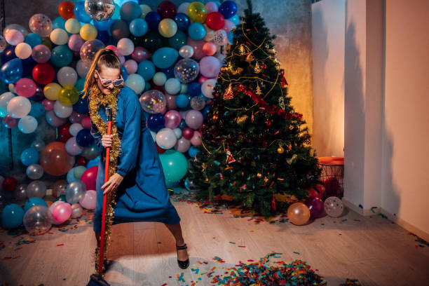 istock Cleaning after new year party celebration 1185178968