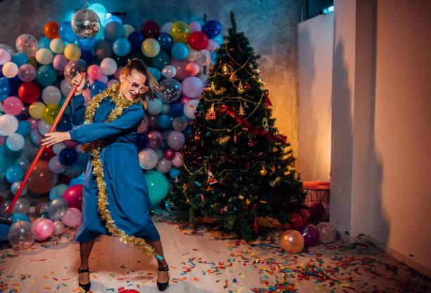 istock Sweeping the house after new year party 1185179057