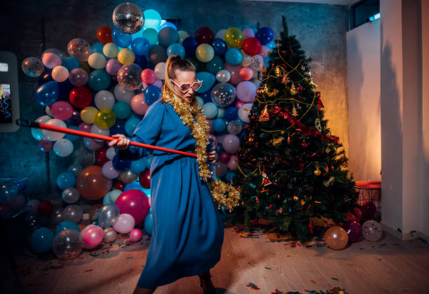 istock Sweeping the house after new year party 1185179078