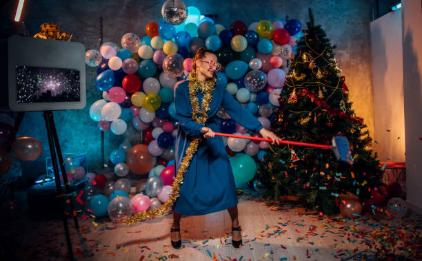 istock Dancing and cleaning after new year party 1185180340