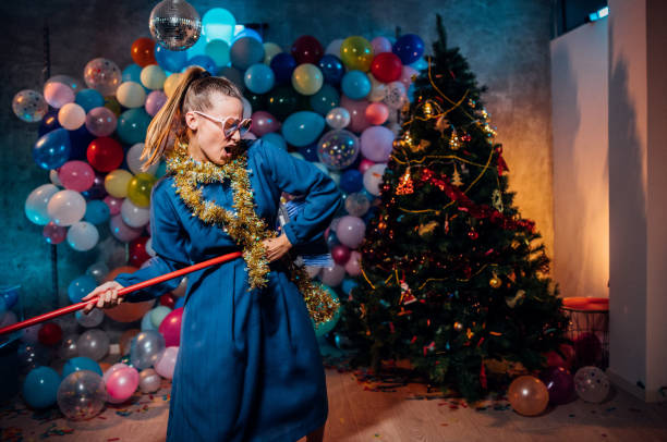 istock Dancing and cleaning after new year party 1185180343
