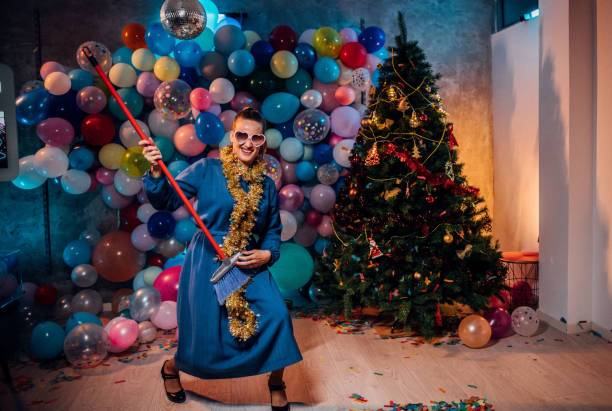 istock Sweeping the house after new year party 1185180887