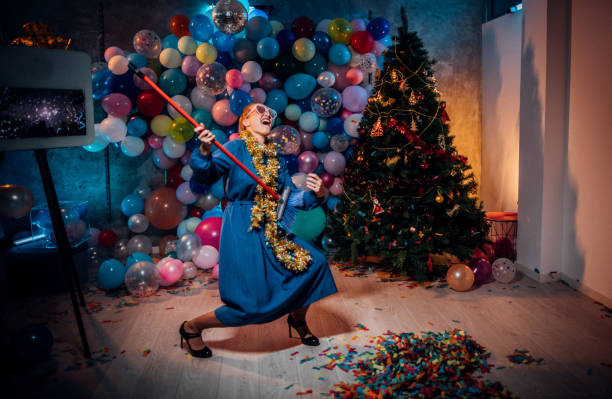 istock Dancing and cleaning after new year party 1185180995