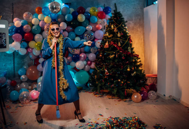 istock Sweeping the house after new year party 1185181144