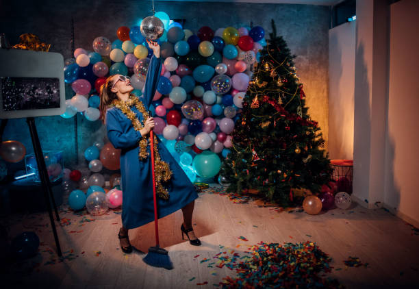 istock Sweeping the house after new year party 1185181257