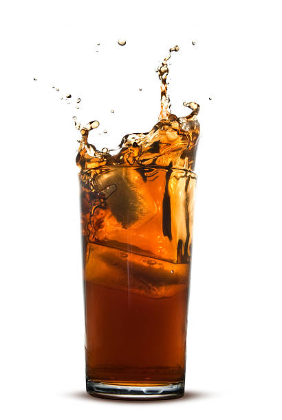 istock splash of cola in glass 118518660