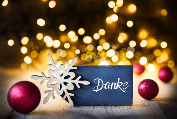 Sparkling Lights, Ball, Snowflake, Danke Means Thank You stock photo