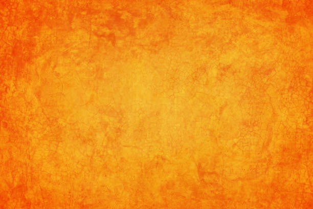 istock yellow and orange cement texture wall in summer background 1185189977