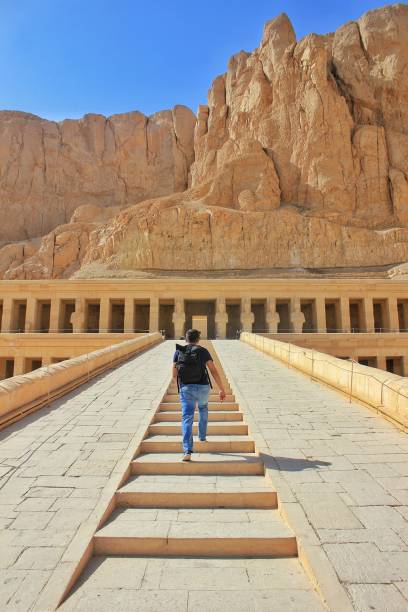 istock Solo traveling man with backpack in the Egypt Kings Valley 1185190785