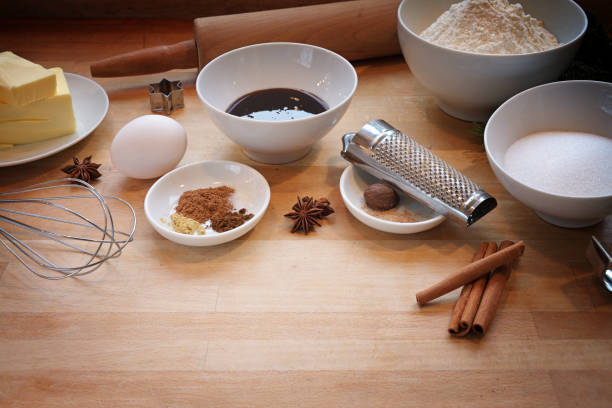 Ingredients for baking gingerbread cookies, traditional homemade pastry in the Christmas time, on a wooden worktop in the kitchen, copy space Ingredients for baking gingerbread cookies, traditional homemade pastry in the Christmas time, on a wooden worktop in the kitchen, copy space, selected focus date syrup stock pictures, royalty-free photos & images