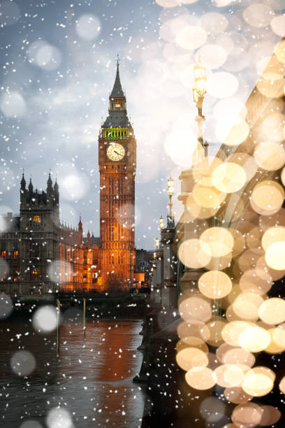 snowing in london - winter in the city stock photo