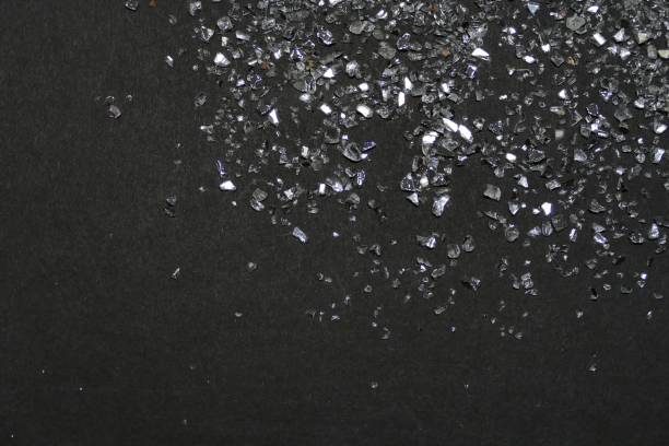 istock Glistening glass on black background 1185195880
