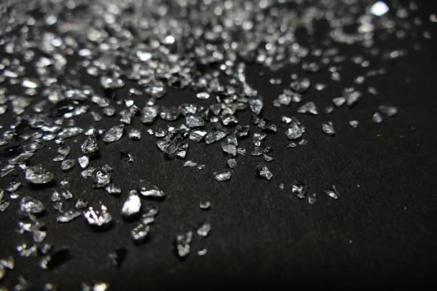 istock Glistening glass on black background 1185195886