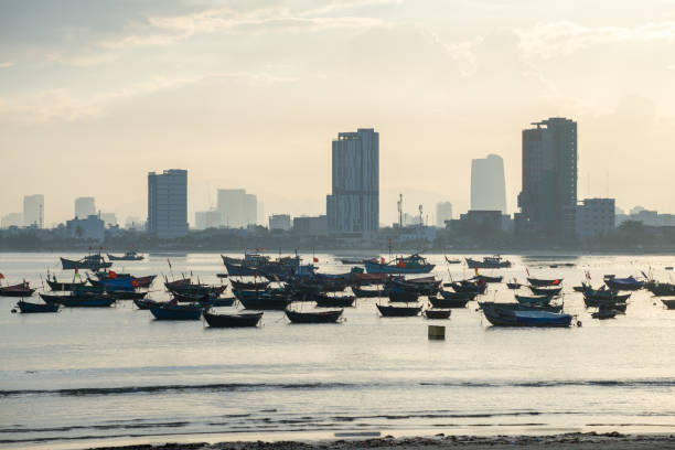 istock Picturesque seascape with coracles on Da Nang Beach 1185197088