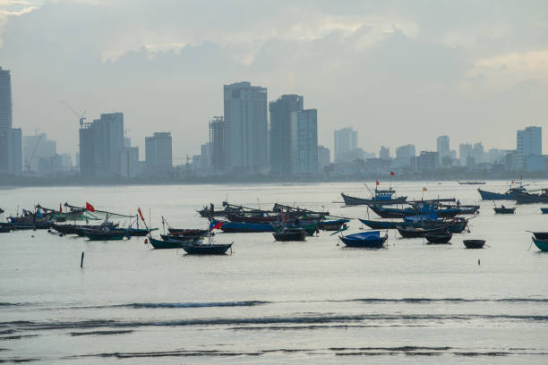 istock Picturesque seascape with coracles on Da Nang Beach 1185197100