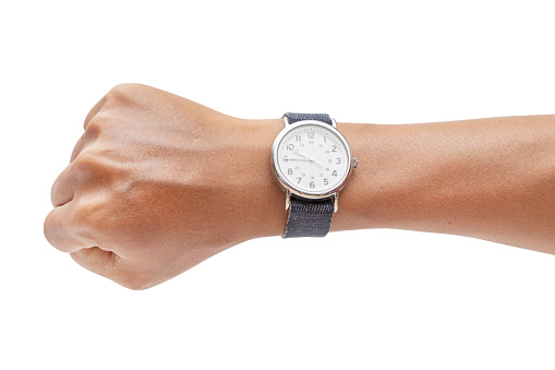 Mano con reloj de pulsera moderno aislado en fondo blanco - caminos de recorte. photo