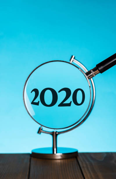 2020 - focus globe magnifying glass glass стоковые фото и изображения