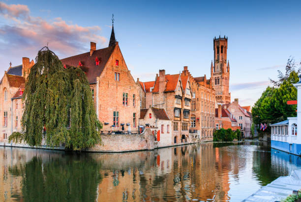 Bruges, Belgium. Bruges, Belgium. The Rozenhoedkaai canal in Bruges with the Belfry in the background. flanders belgium photos stock pictures, royalty-free photos & images