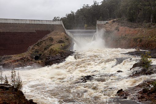 View of the spillway at Rowallan Dam during flood conditions, part of the Tasmanian Hydro electric system