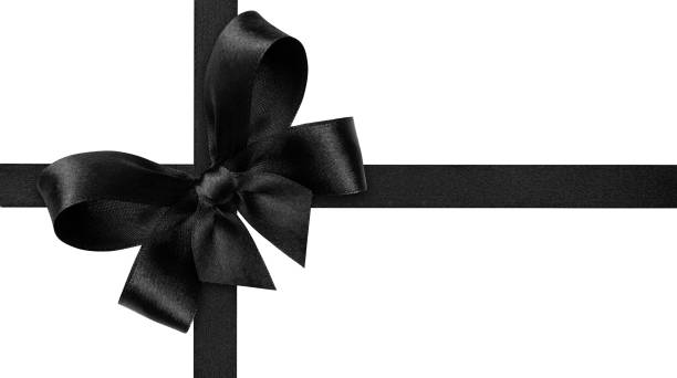 Black ribbon with gift bow isolated on white background