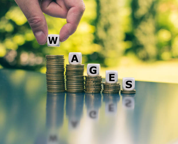 istock Concept of wages going down. 1185205431