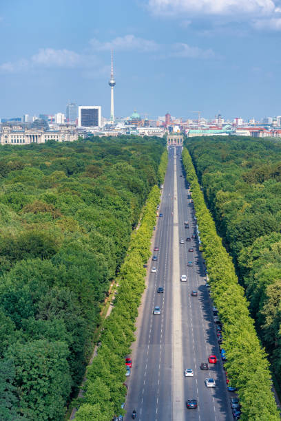 istock Berlin city skyline with long boulevard on foreground, Germany 1185208060