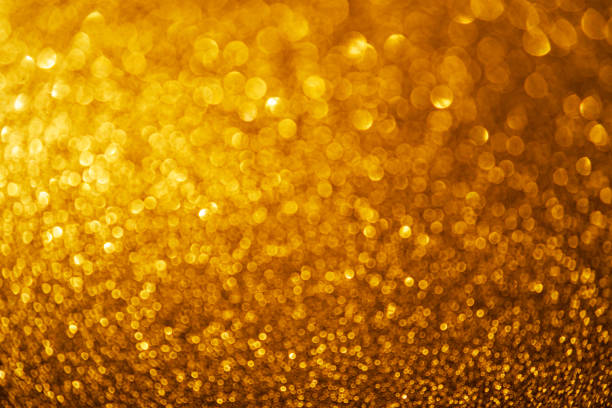 istock Golden bokeh holiday party background. 1185208387