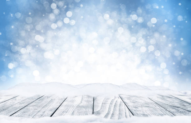 istock Decorative Christmas background with bokeh lights and snowflakes. 1185212426