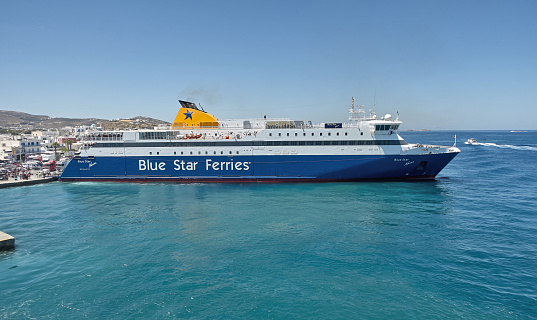 Paikia, Paros island, Greece - July 02, 2019:  Ferry boat Blue Star Naxos at Paros port on July 2, 2019.
