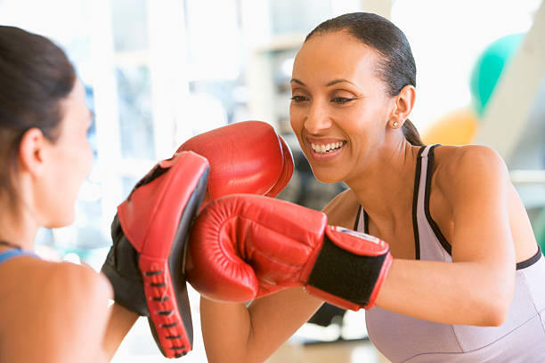 istock Women Boxing At Gym 118521720