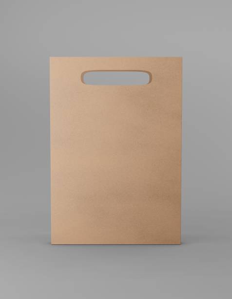 istock Eco packaging mockup bag kraft paper with handle front side. Standart medium brown template on gray background promotional advertising. 3D rendering 1185220656