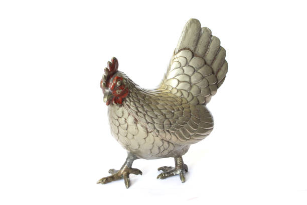 istock A Silver Metal Cockerel Chicken Decoration Figure on White Background 1185222317