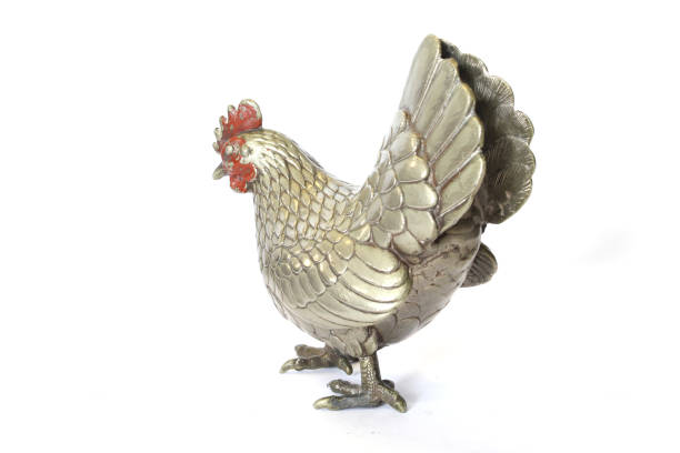 istock A Silver Metal Cockerel Chicken Decoration Figure on White Background 1185222340
